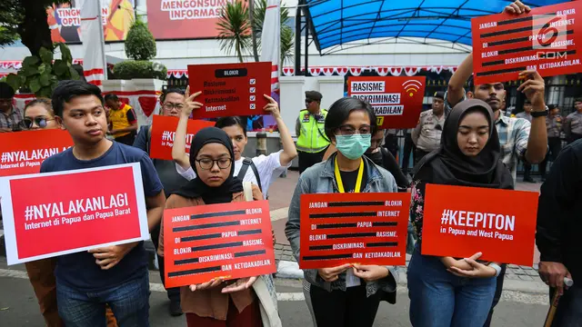 037008900_1566556086-20190823-Aksi-Tolak-Pembatasan-Internet-di-Papua-dan-Papua-Barat-PRADOLO-5.jpg